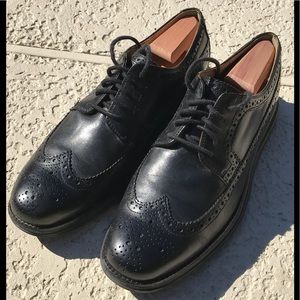 Cole Haan Lunergrand Black Oxford wingtips.